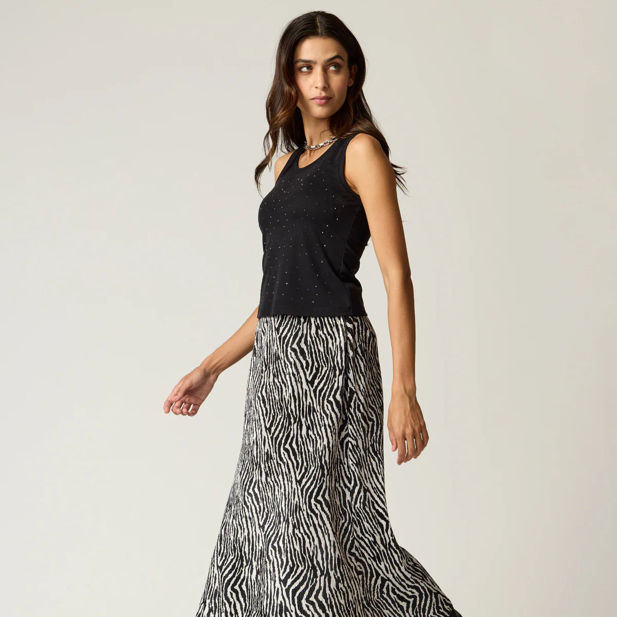 TOP NEGRO REMACHES PLATA