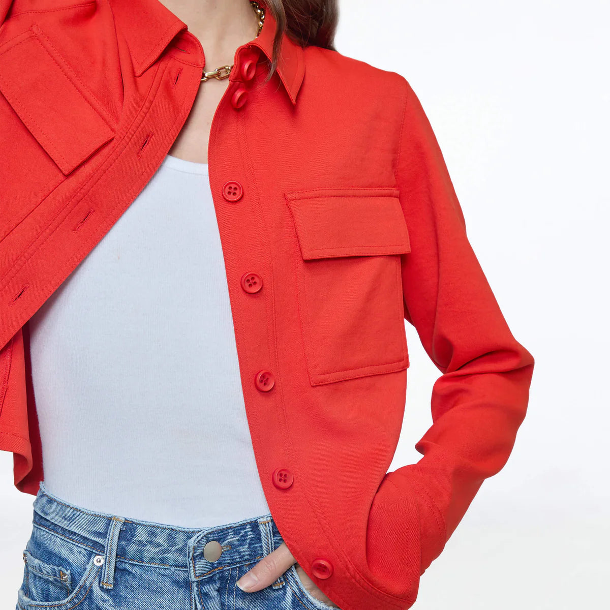 CHAMARRA NARANJA CON BOLSAS