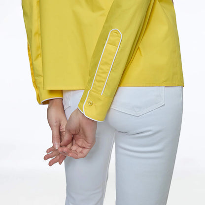 CAMISA AMARILLA CON BIES BLANCO